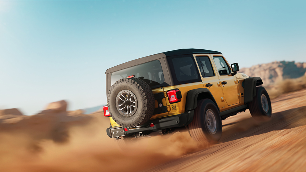 2026 Jeep Wrangler Willys 392 kicking up dust on dirt road from behind