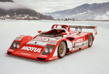 Red race car in snow at FAT International FAT Ice Race