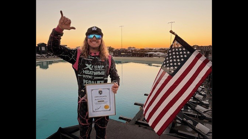 Blake Wilkey holding Word Record certificate