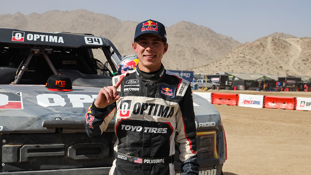 Christopher Polvoorde standing in front of truck at King of the Hammers