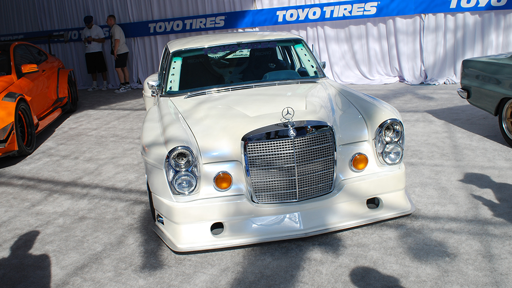 Customized Mercedes 300 SEL, nicknamed the "Blue Boar" and built by Smokedogg Customs at SEMA Show 2025.