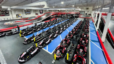 The pit lane at K1 Speed Totowa features four rows of adult go-karts and two rows of junior go-karts.