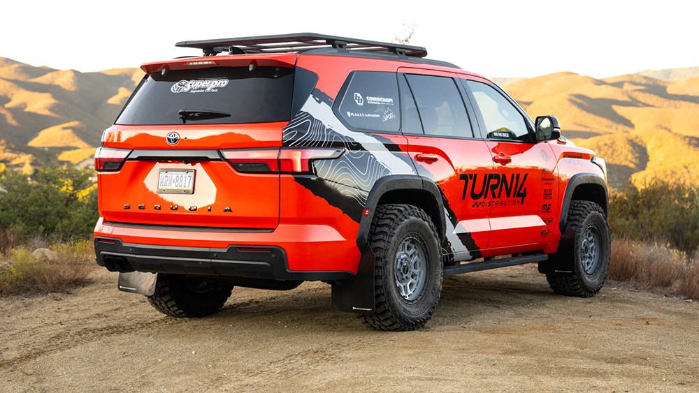 Red T14 x SuperPro Toyota Sequoia TRD parked in the hills