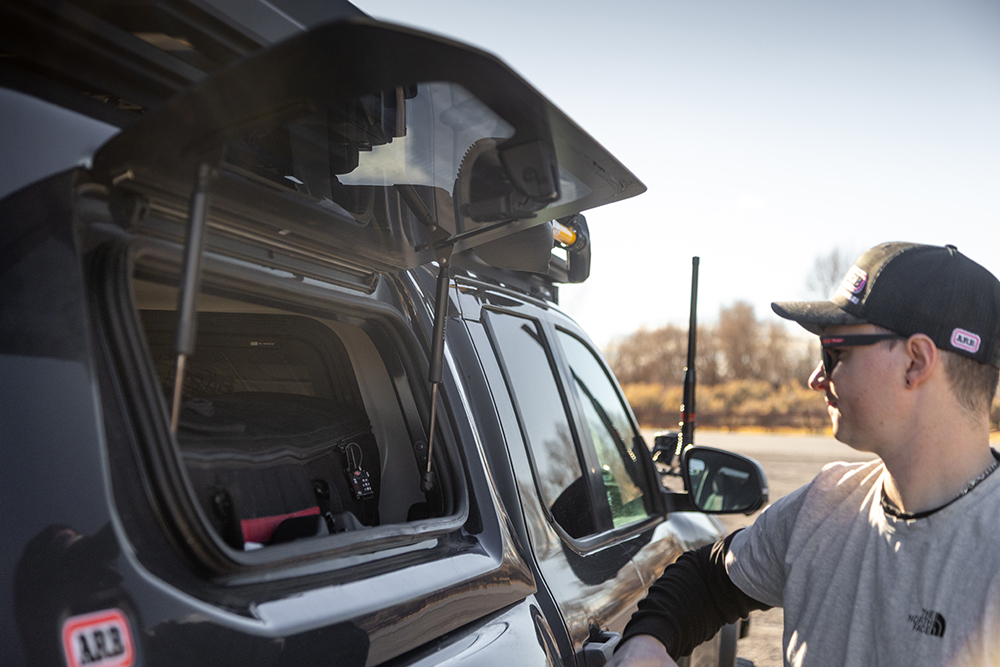 The ARB Ascent Truck Cap and man