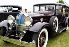 1932 Packard Model 904 Deluxe Eight parked on grass at car show