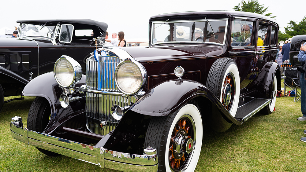 1932 Packard Model 904 Deluxe Eight parked on grass at car show