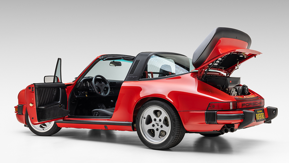 1985 Porsche 911 Carrera Targa RUF BTR III from rear with driver's door and trunk open