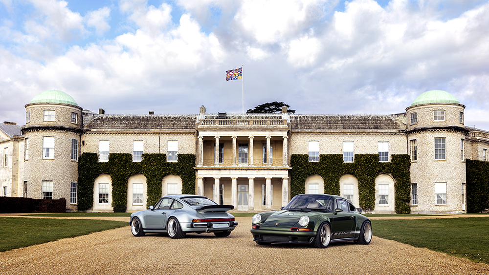Two Porsches parked in front of Goodwood Estate
