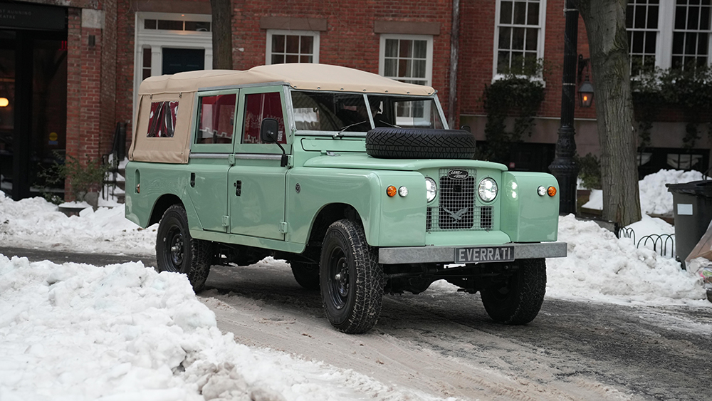 Everrati’s electric Land Rover Series IIA parked in snowy street