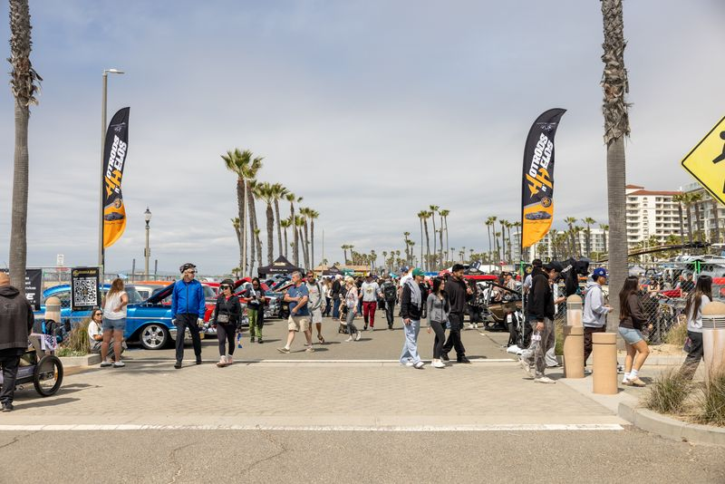 attendees enjoy hot rods n' heroes car show