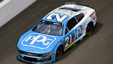 Josh Berry driving the No. 21 PPG Ford Mustang Dark Horse for Wood Brothers Racing at the 2025 Brickyard 400