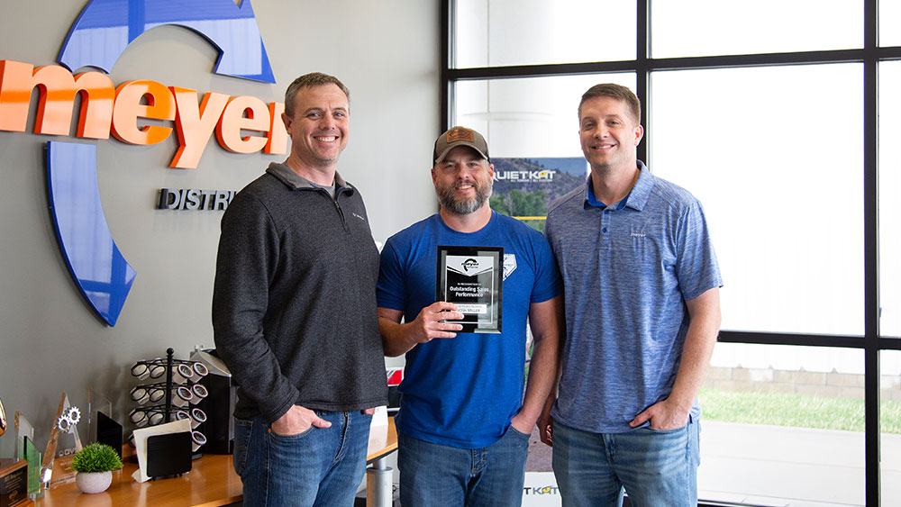 Josh Miller receiving 2025 Q4 Sales Performance Award from Meyer Distributing