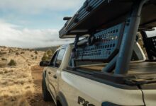 off-road racks yakima pickup side angle black rack on tan truck