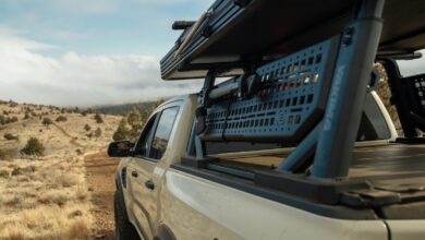 off-road racks yakima pickup side angle black rack on tan truck