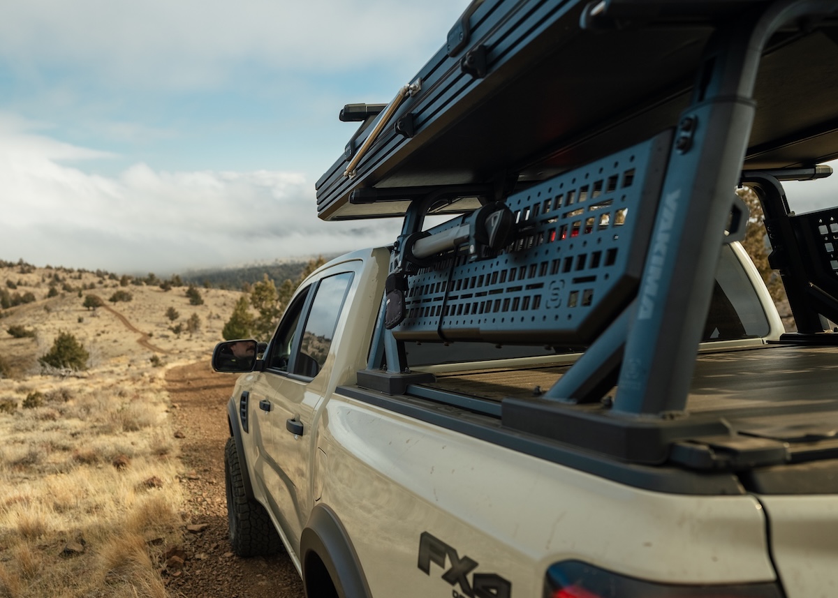 off-road racks yakima pickup side angle black rack on tan truck