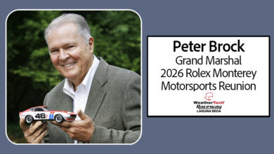 Peter Brock with a scale model of the 1971 Championship BRE Datsun 240Z