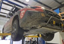 primitive crosstrek on lift in work bay