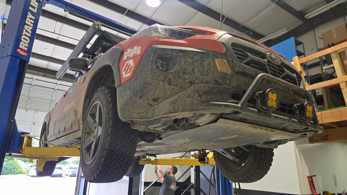 primitive crosstrek on lift in work bay