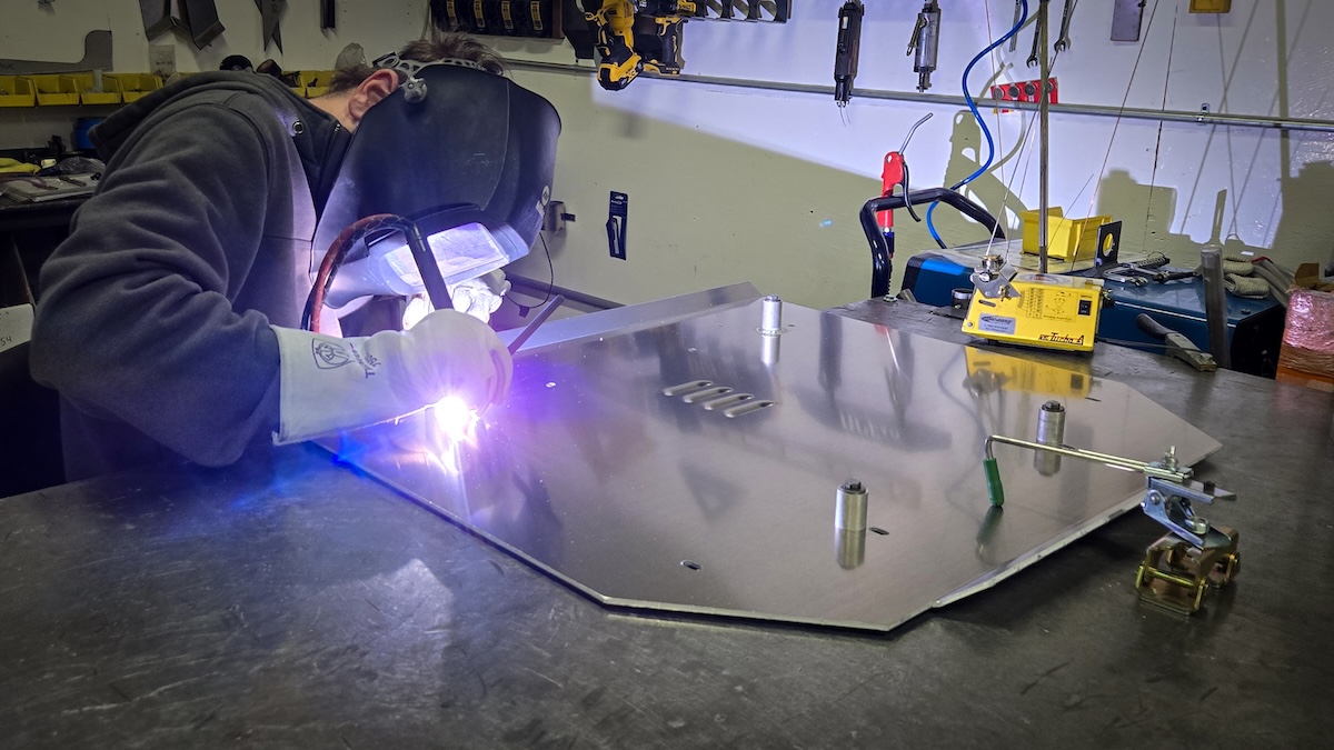 primitive racing welding in progress