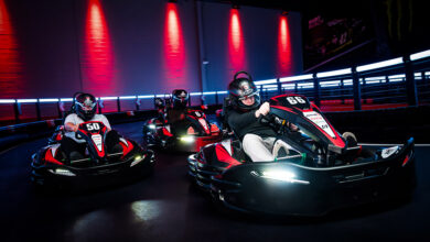Karts racing on track at RPM Raceway