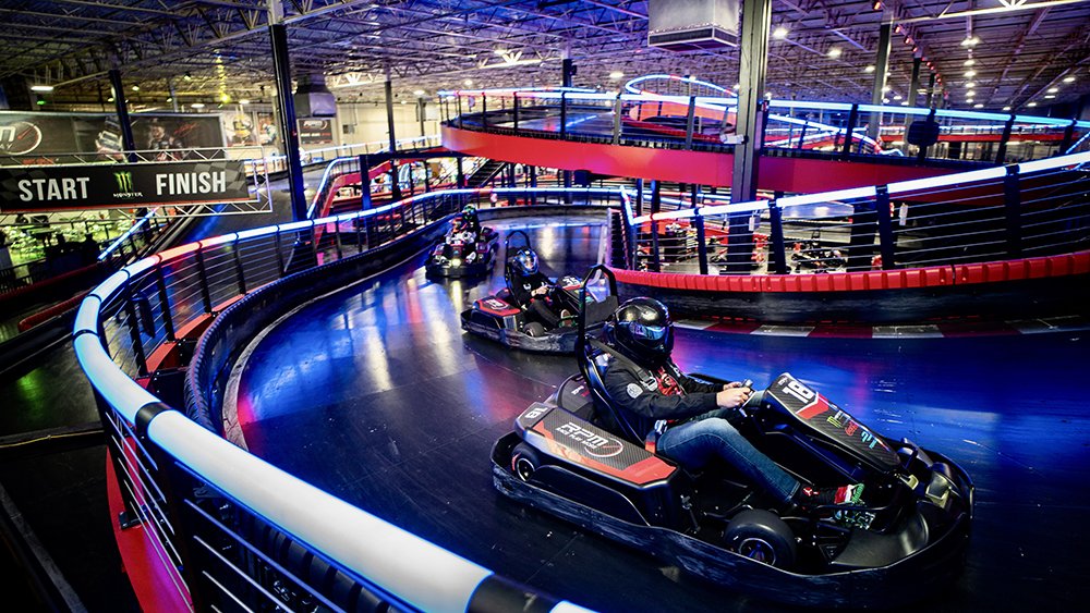 Karts racing on track at RPM Raceway
