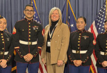 Vets on stage who work at Stanadyne Jacksonville plant