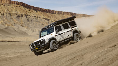 Storyteller Overland Grand Bohemain driving down dirt hill