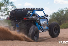 T14 x Bilstein Can-Am Maverick X3 kicking up sand