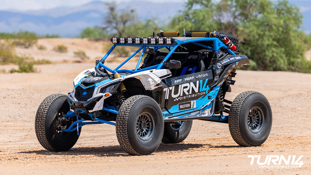 T14 x Bilstein Can-Am Maverick X3 parked in desert
