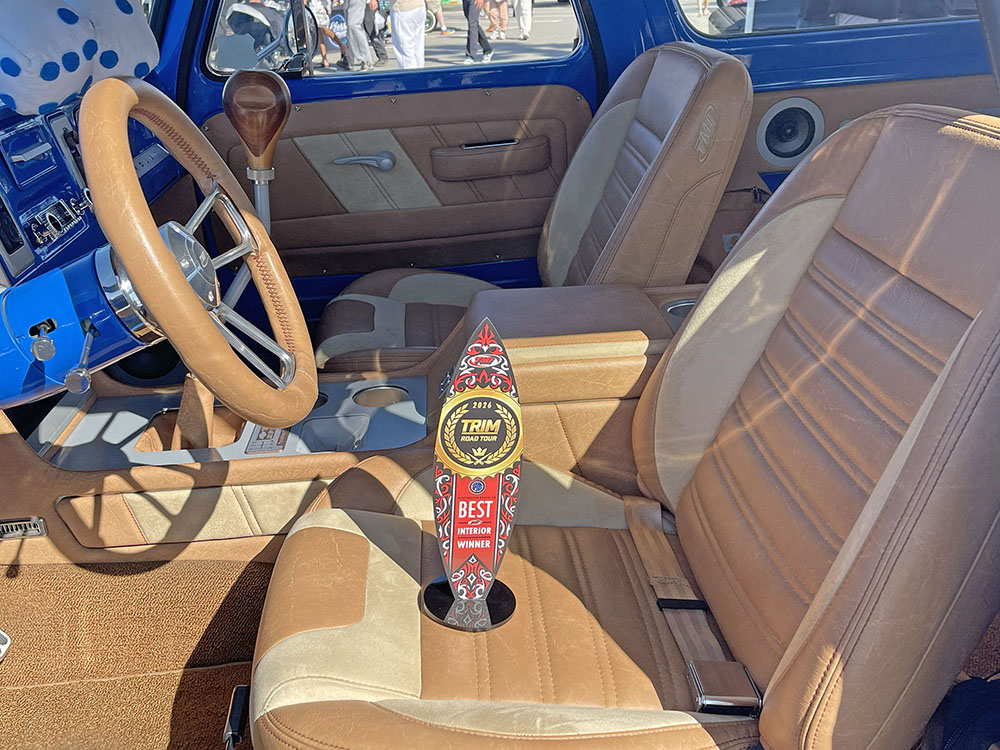 The interior of the 1965 Suburban with trophy on seat