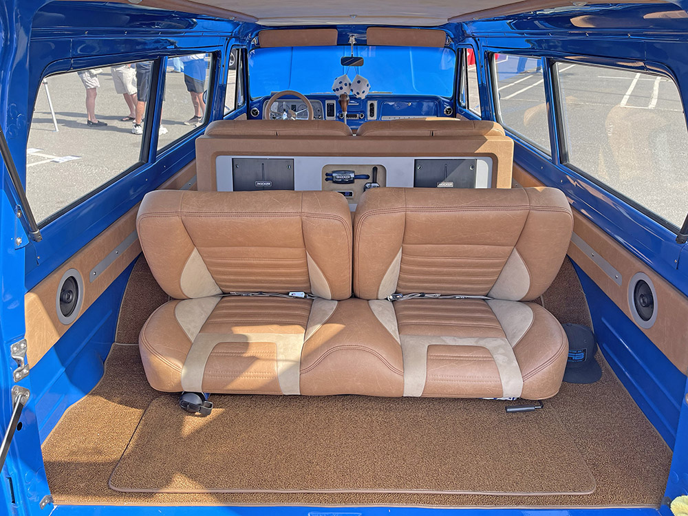 The rear interior of the 1965 Suburban with trophy on seat