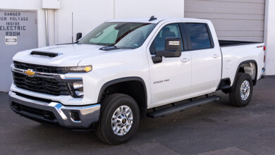 The Raptor Series HD WorkStep mounted on a white Chevrolet truck