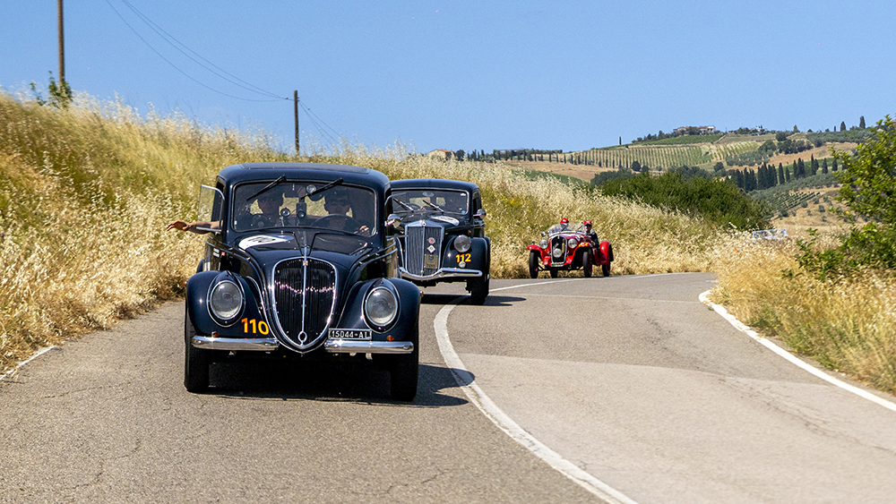 Classic race cars on the road at the 1000 Miglia 2025