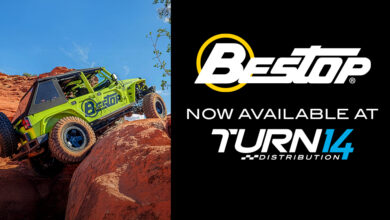 Bestop and Turn 14 Distribution logos with photo of Jeep driving on rocks
