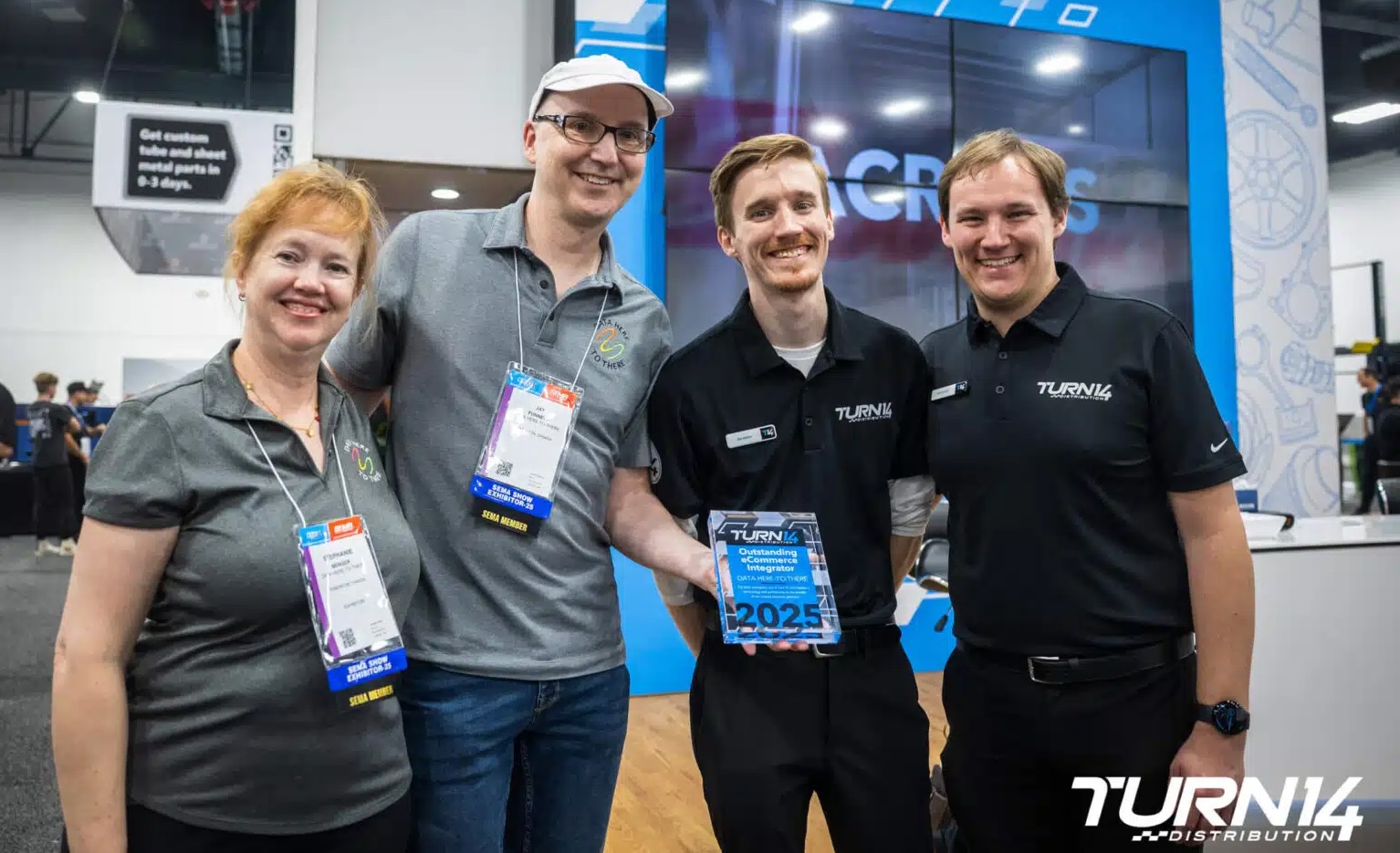 data here-to-there representatives celebrate the Outstanding eCommerce Integrator by Turn 14 Distribution.
