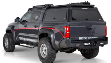 The Westin EXP Truck Cap on black Toyota Tacoma.