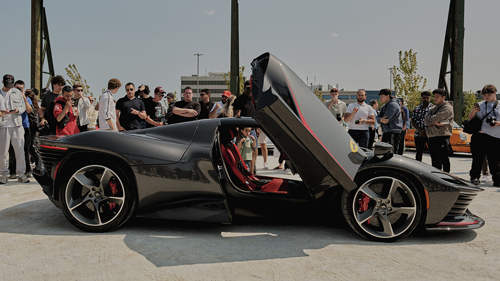 Ferrari with open doors outside at Concours ROYALMOUNT