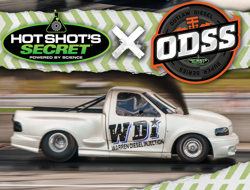 Hot Shots Secret and Outlaw Diesel Super Series logs above truck on racetrack