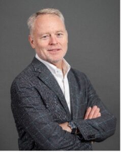 mahle general manager Christian Karner waist-up portrait