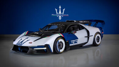 Maserati MCXtrema with Maserati logo in background
