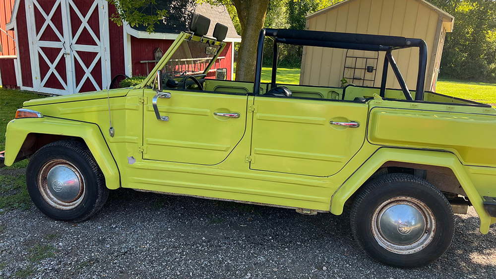 Original 1974 Volkswagen Thing paked in front of sheds