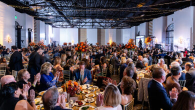 Tables filled with guests at Petra Cares Gala