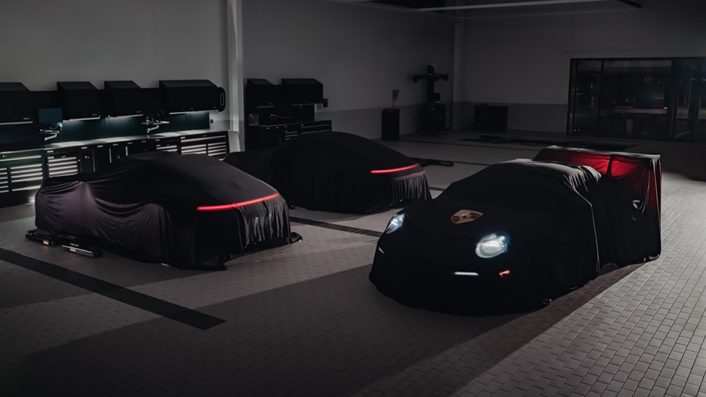 Three bespoke Porsche 911s under wraps in buidling