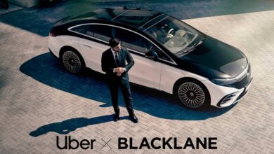 uber blacklane black and white limo with driver