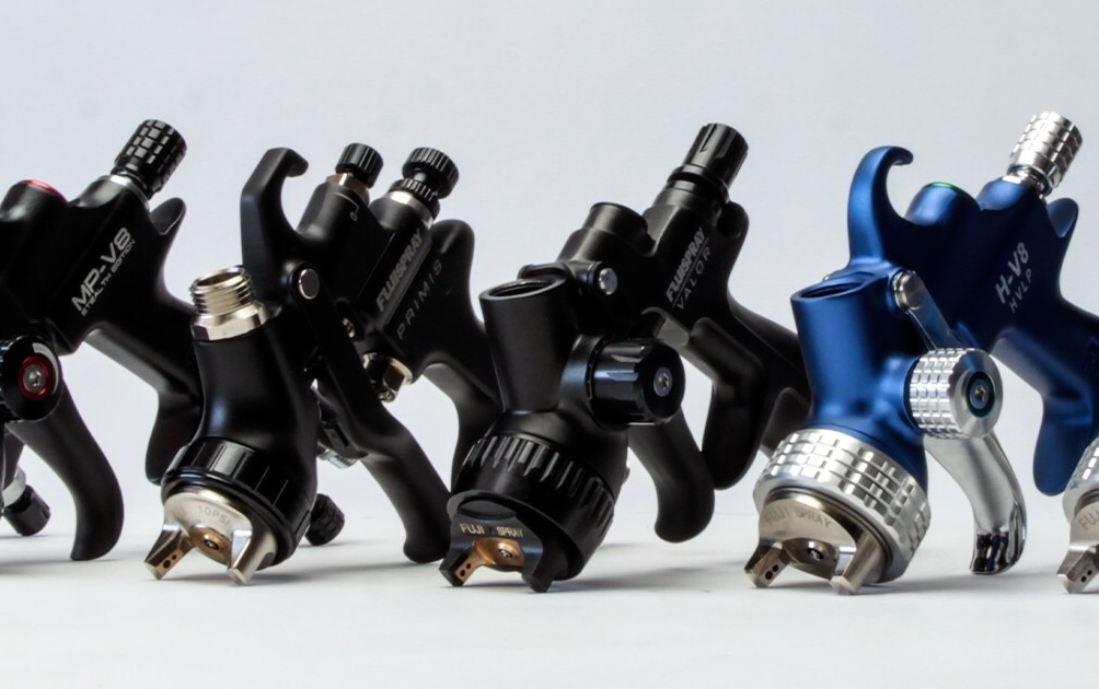 universal technical institute fuji spray guns in a line