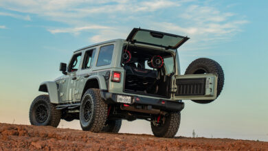 Jeep with its tailgate open showing speakers
