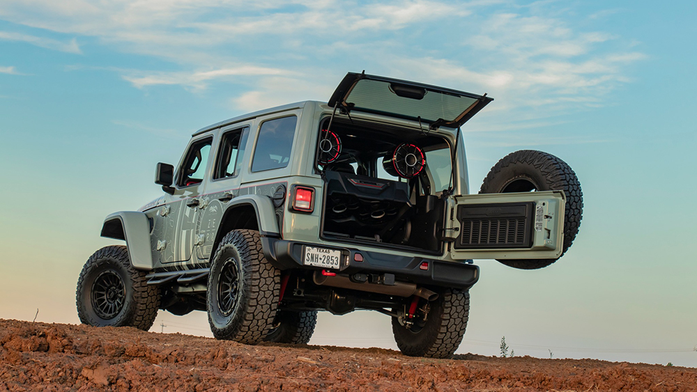 Jeep with its tailgate open showing speakers