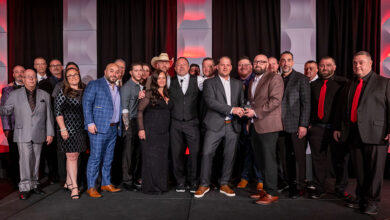 Group of Ziebart owners and leaders on stage