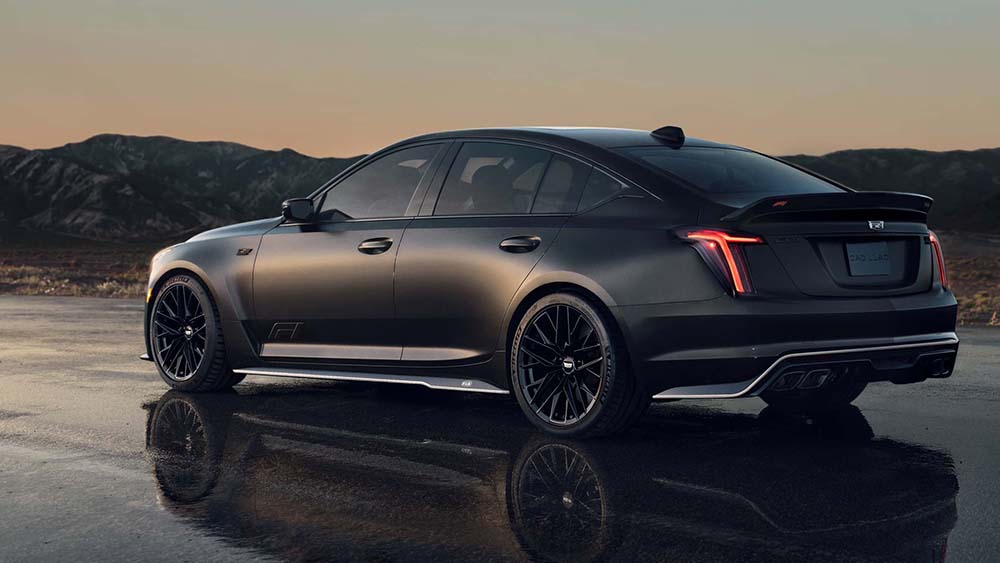 2026 Cadillac CT5 Blackwing F1 from rear with mountains in background