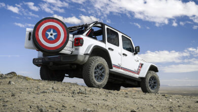 2026 Jeep Wrangler America250 from behind with tailgate open and Captain America shield tire cover